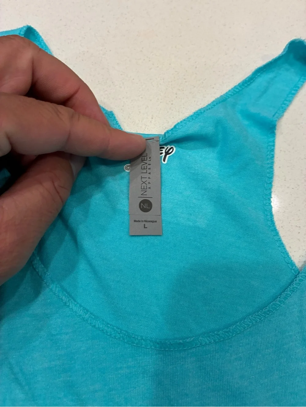 Next Level Apparel Turquoise Alice 'Oh, Dear' Racerback Tank